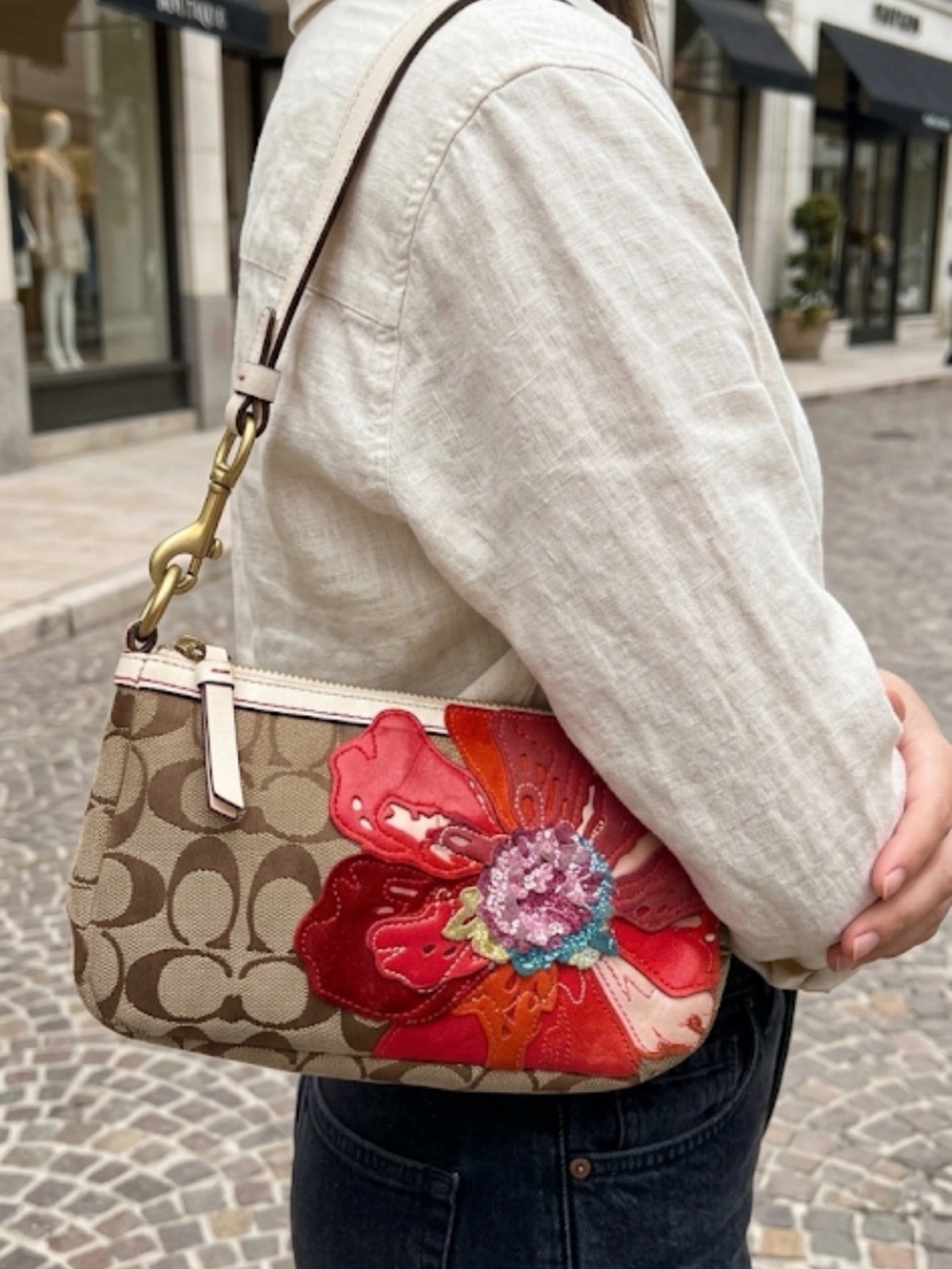 Coach Brown Signature Canvas Wristlet with Multicolor Floral Appliqué